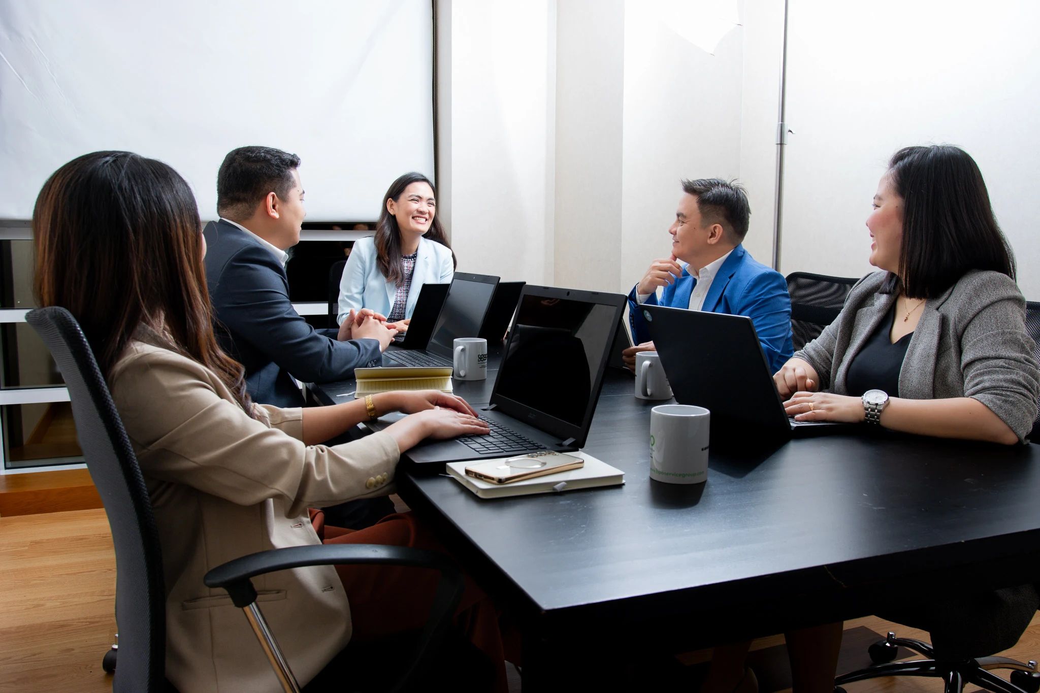 BPOAS accounting team reviewing client accounts together in a meeting